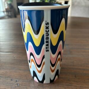 Starbucks 12 ounce ceramic travel cup with black lid